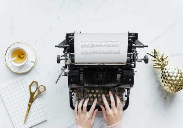 Freelancer At A Typewriter